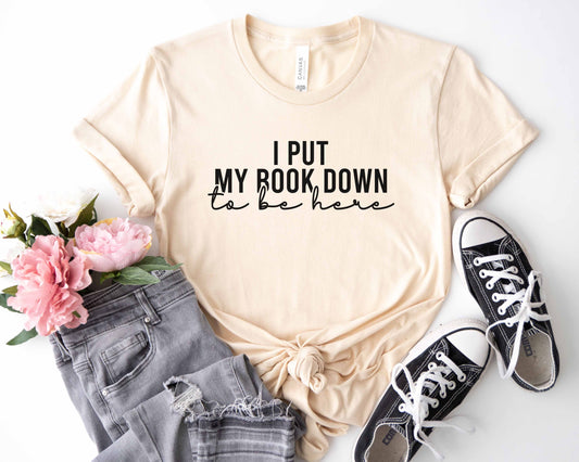 I Put My Book Down To Be Here Unisex T-Shirt