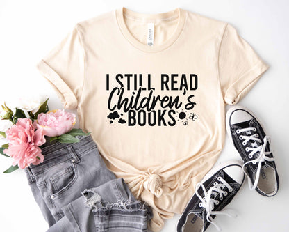 I Still Read Children's Books T-Shirt