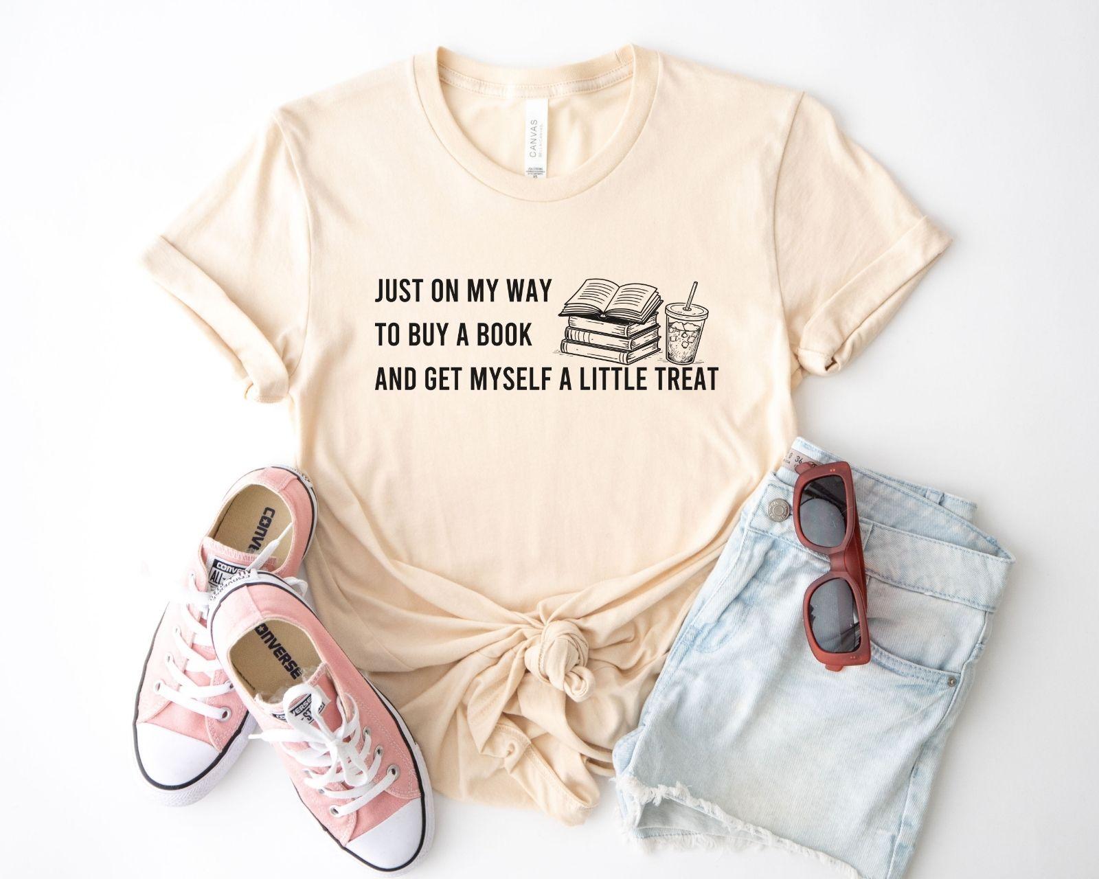 Natural t-shirt with text, pink sneakers, denim shorts, and sunglasses on a white background