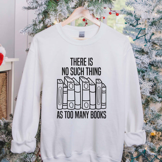 A white color sweatshirt with the saying "There is no such thing as too many books"