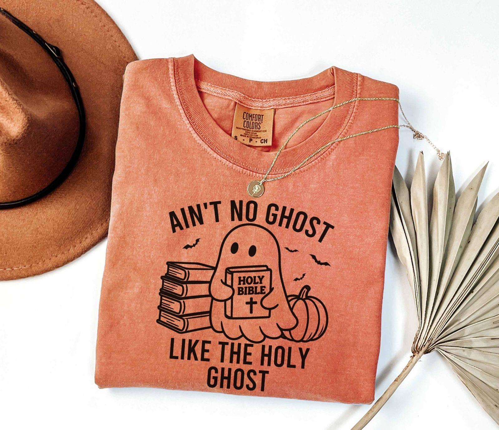 A comfort colors shirt with the saying "ain't no ghost like the holy ghost"