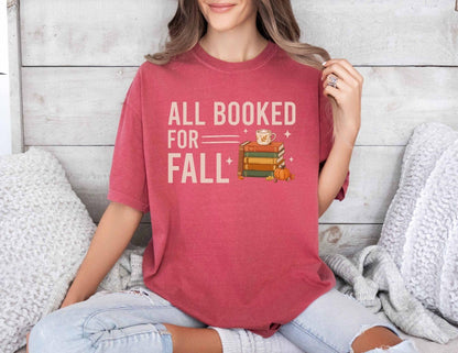 A comfort colors® shirt with the saying "all booked for fall"