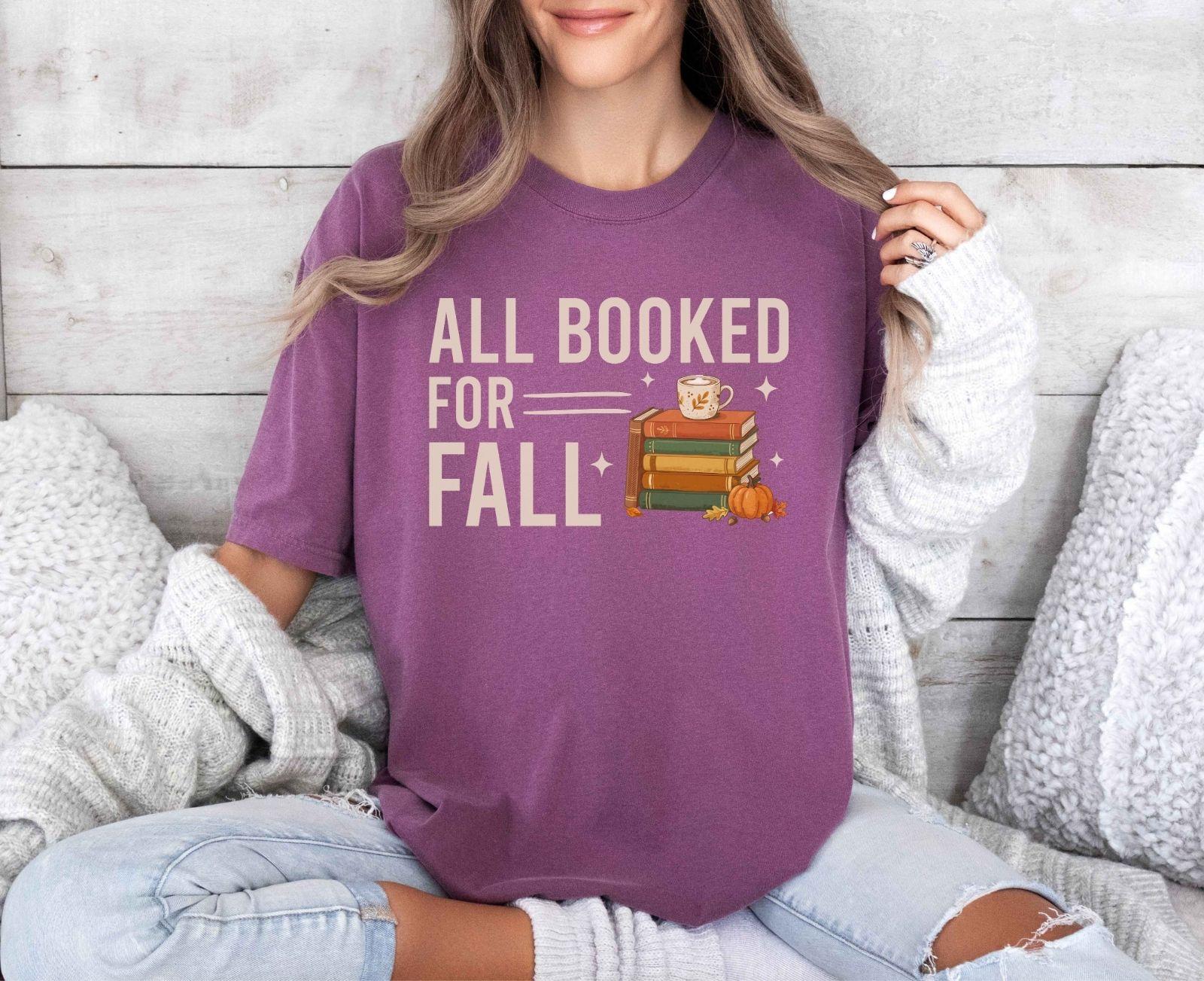 A comfort colors® shirt with the saying "all booked for fall"
