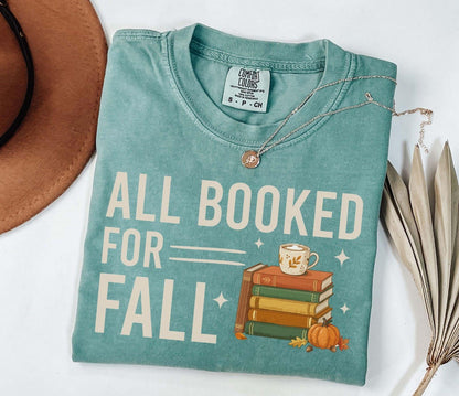 A comfort colors® shirt with the saying "all booked for fall"