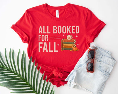 A bella canvas 3001 shirt with the saying "all booked for fall"