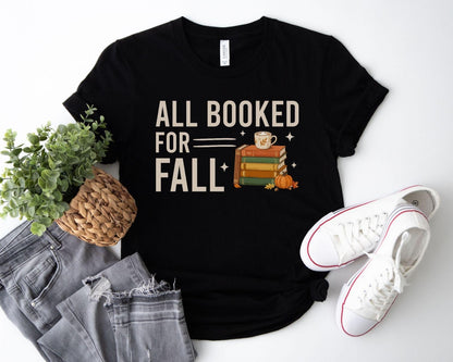 A bella canvas 3001 shirt with the saying "all booked for fall"