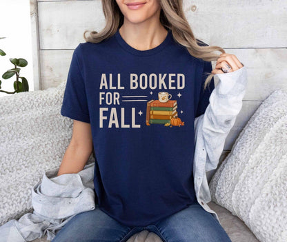 A bella canvas 3001 shirt with the saying "all booked for fall"