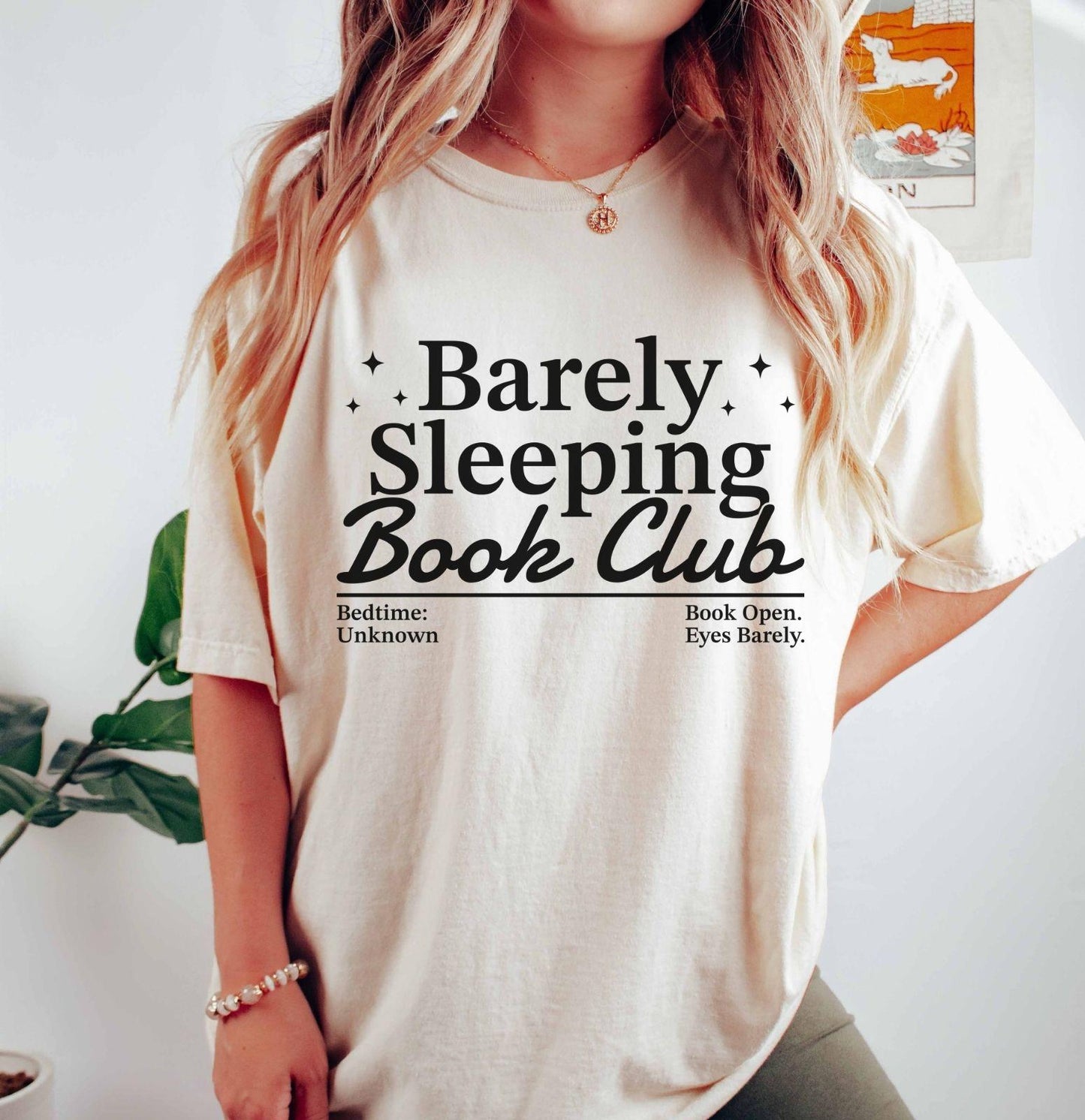A comfort colors® shirt with the saying "barely sleeping book club"