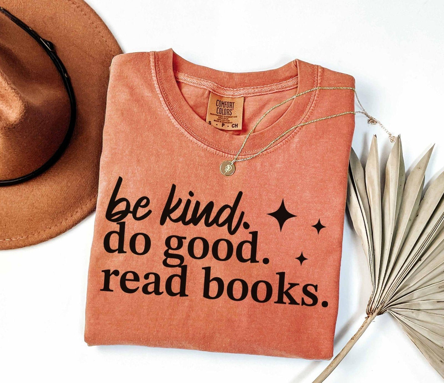 A comfort colors® shirt with the saying "be kind do good read books"