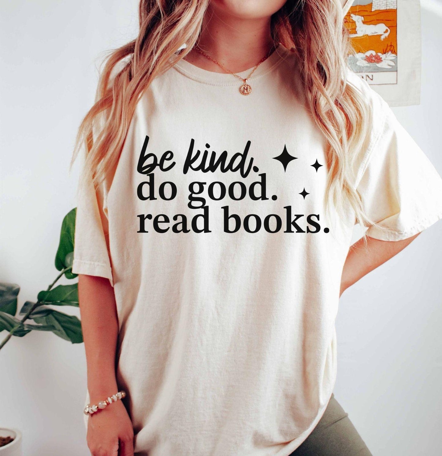 A comfort colors® shirt with the saying "be kind do good read books"