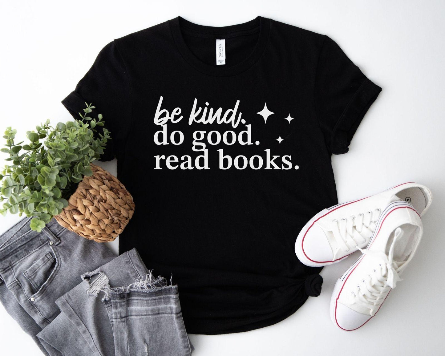 A bella canvas 3001 shirt with the saying "be kind do good read books"