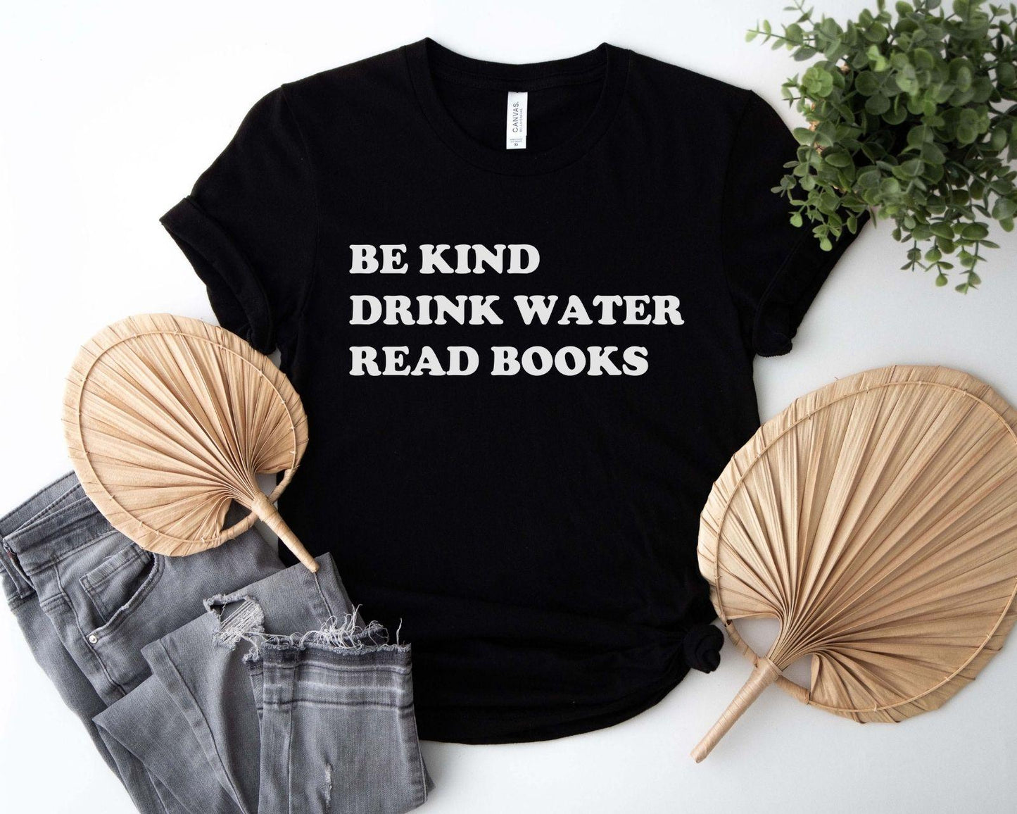 A comfort colors® shirt with the saying "be kind drink water read books"