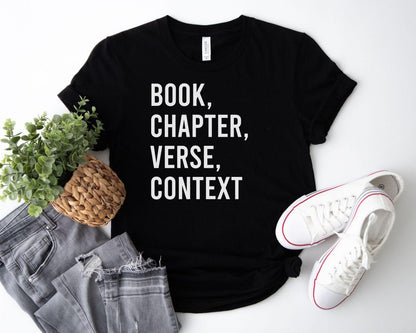 A bella canvas 3001 shirt with the saying "book chapter verse context"