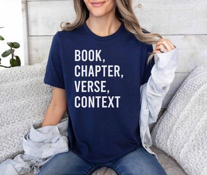 A bella canvas 3001 shirt with the saying "book chapter verse context"
