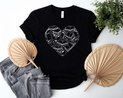 A comfort colors® shirt with the saying "book heart"