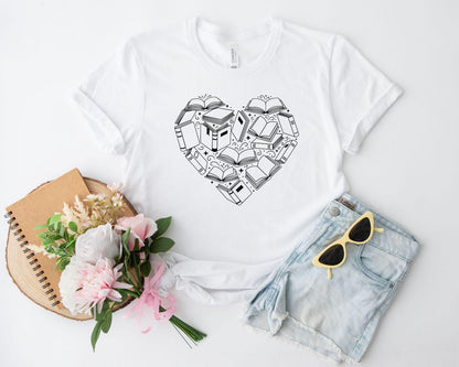 A comfort colors® shirt with the saying "book heart"