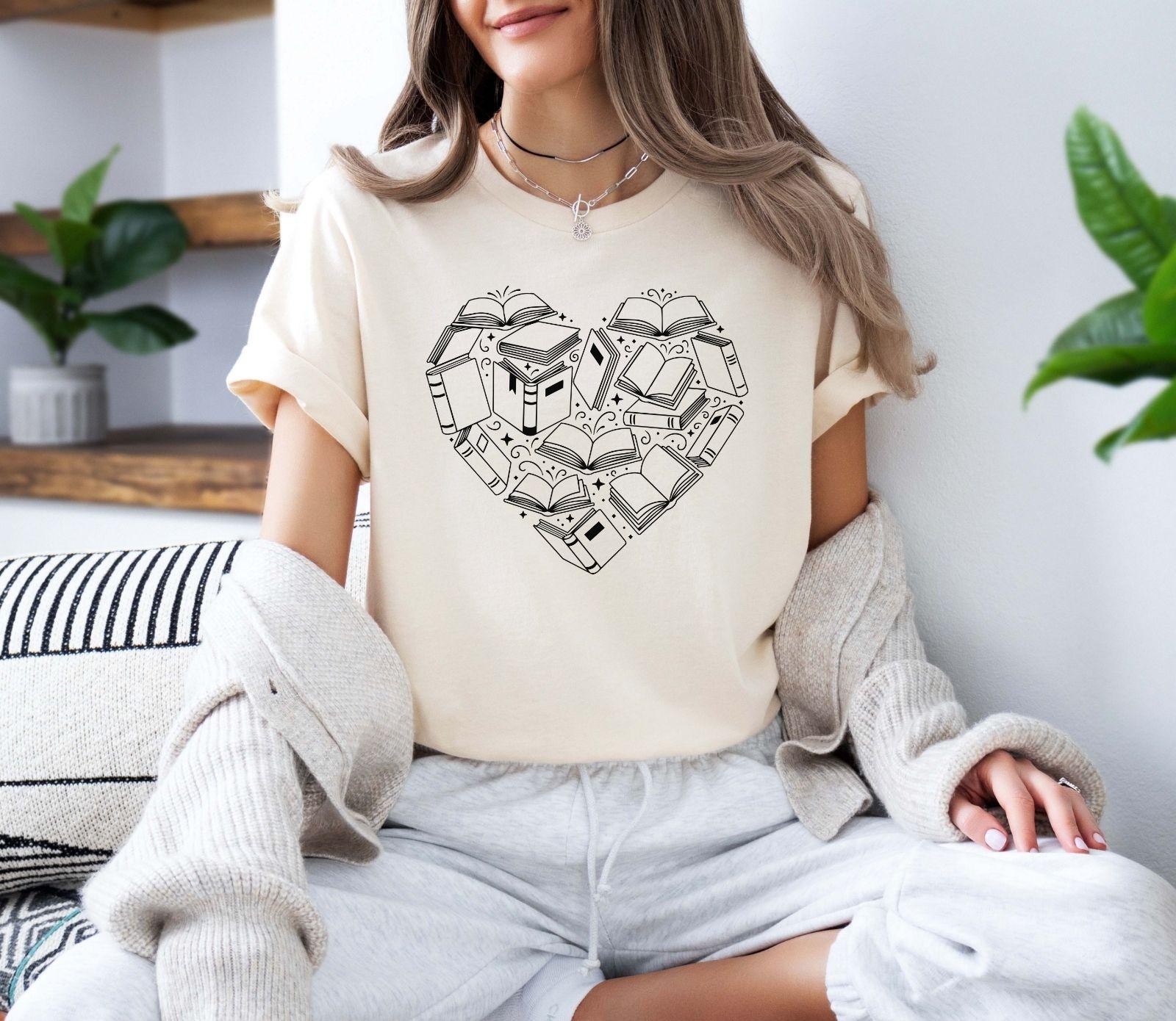 A comfort colors® shirt with the saying "book heart"