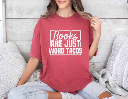 A comfort colors shirt with the saying "Books are just word tacos"