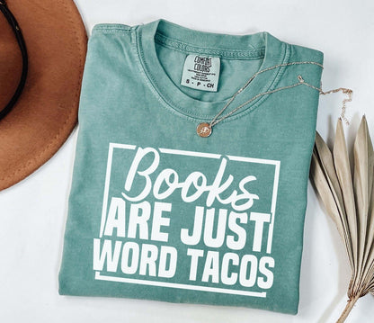 A comfort colors shirt with the saying "Books are just word tacos"
