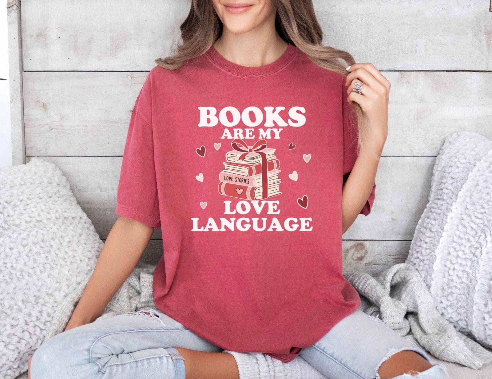  A comfort colors shirt with the saying "books are my love language"