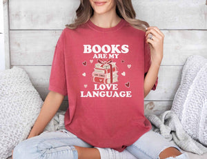  A comfort colors shirt with the saying "books are my love language"