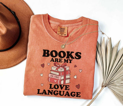  A comfort colors shirt with the saying "books are my love language"