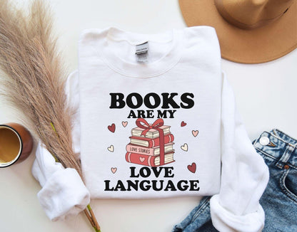 A gildan 18000 sweatshirt with the saying "Books are my love language"