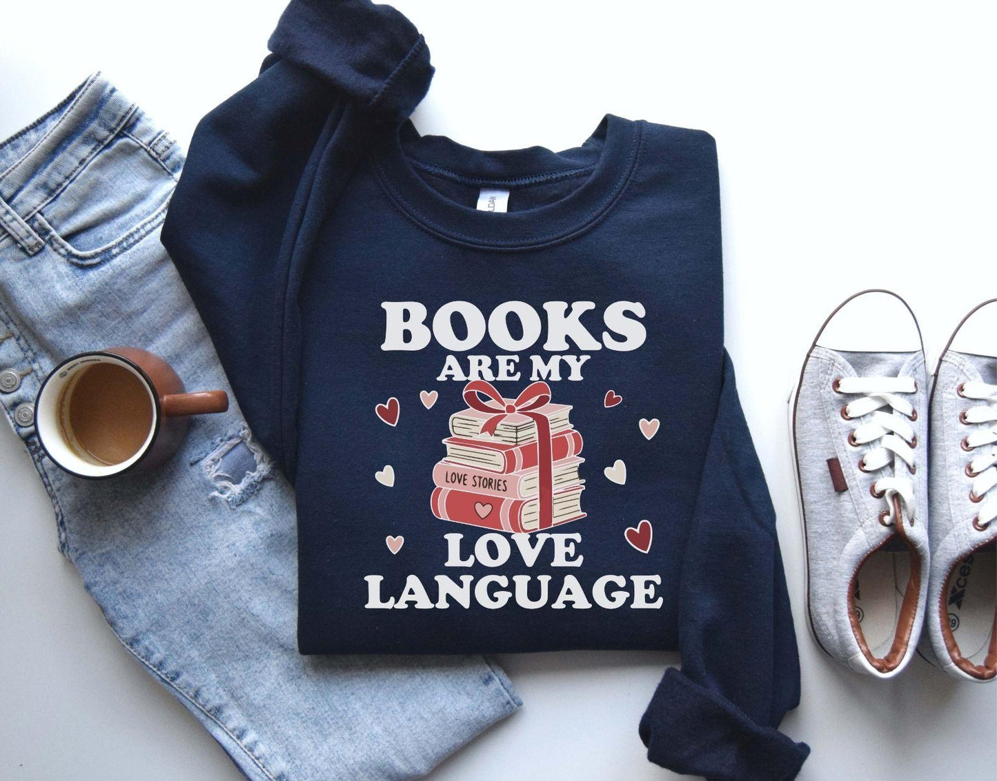 A gildan 18000 sweatshirt with the saying "Books are my love language"