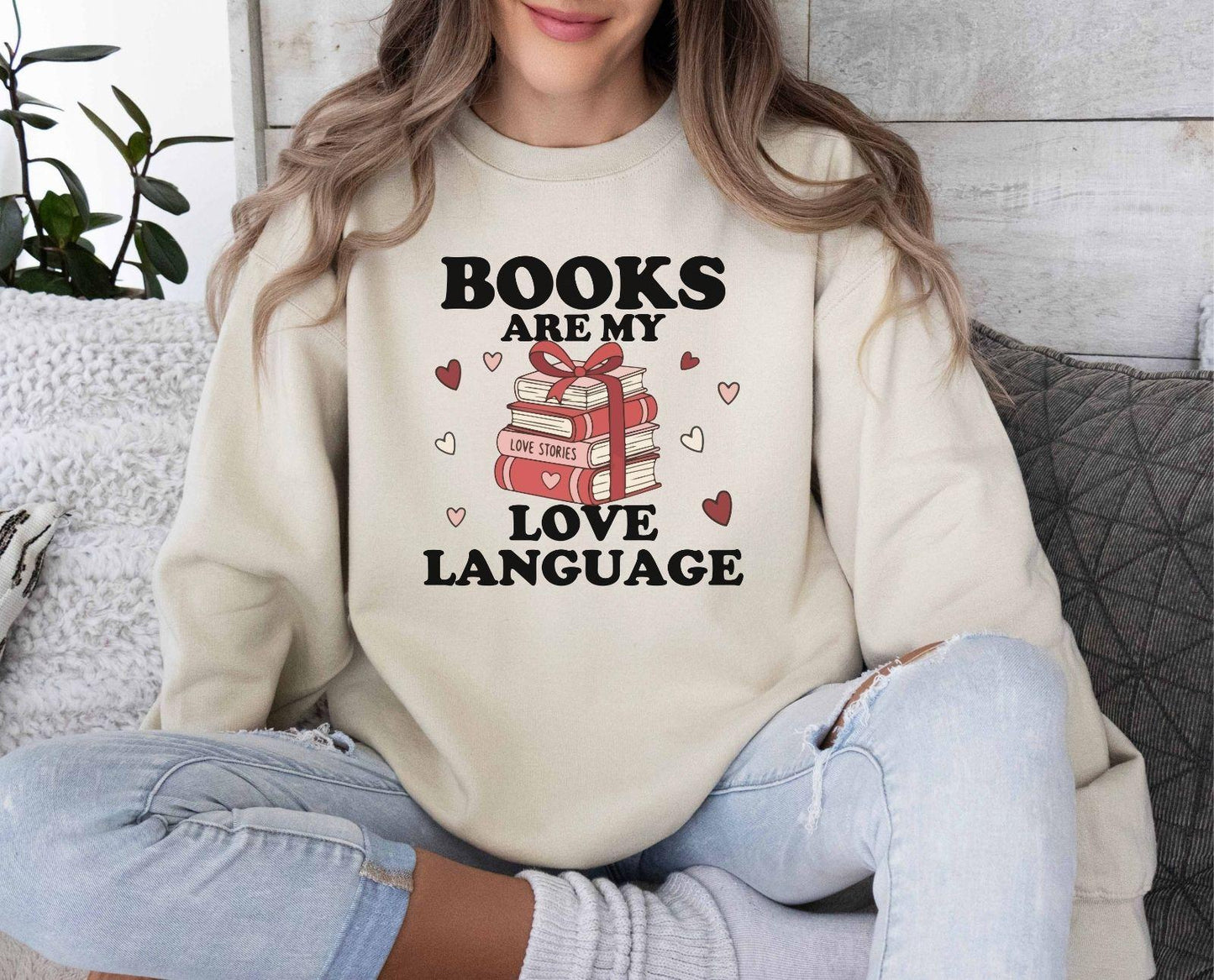 A gildan 18000 sweatshirt with the saying "Books are my love language"