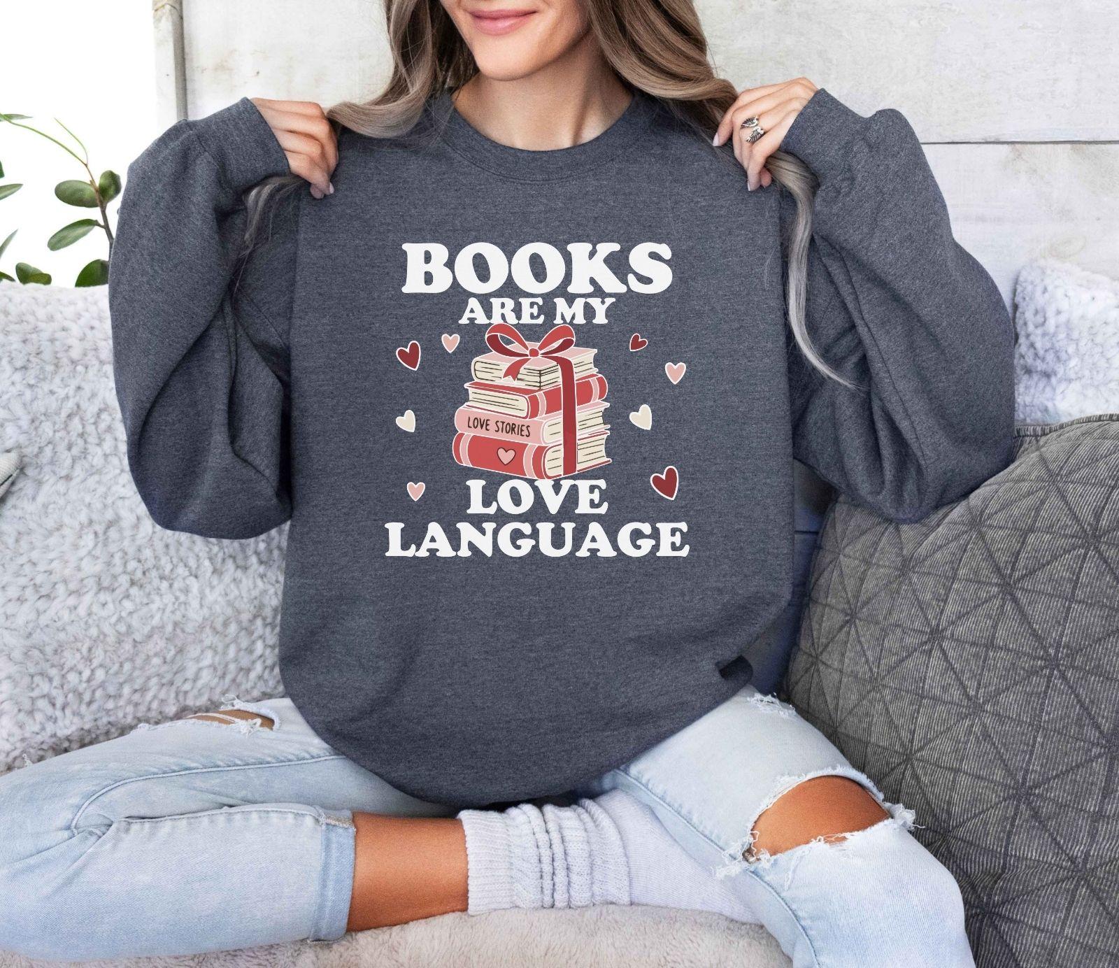 A gildan 18000 sweatshirt with the saying "Books are my love language"