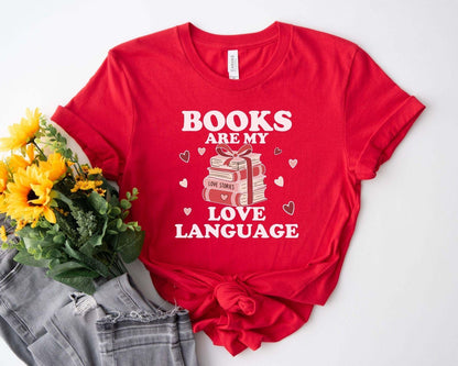 A gildan 18000 sweatshirt with the saying "Books are my love language"