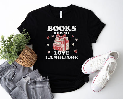 A gildan 18000 sweatshirt with the saying "Books are my love language"