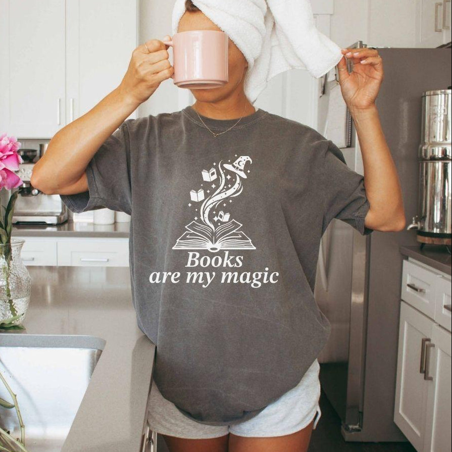 A comfort colors® shirt with the saying "books are my magic"