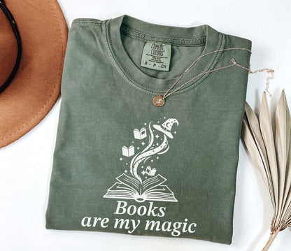 A comfort colors® shirt with the saying "books are my magic"