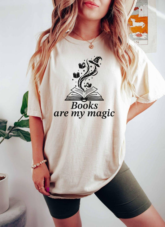 A comfort colors® shirt with the saying "books are my magic"