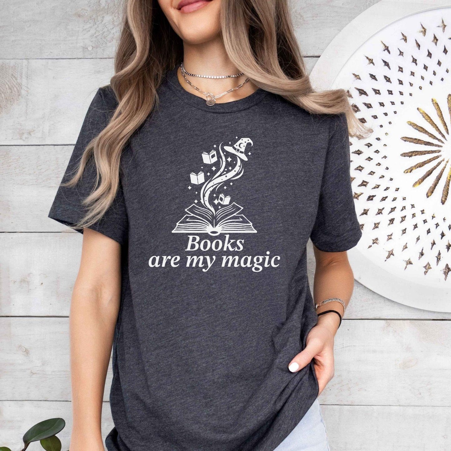 A comfort colors® shirt with the saying "books are my magic"
