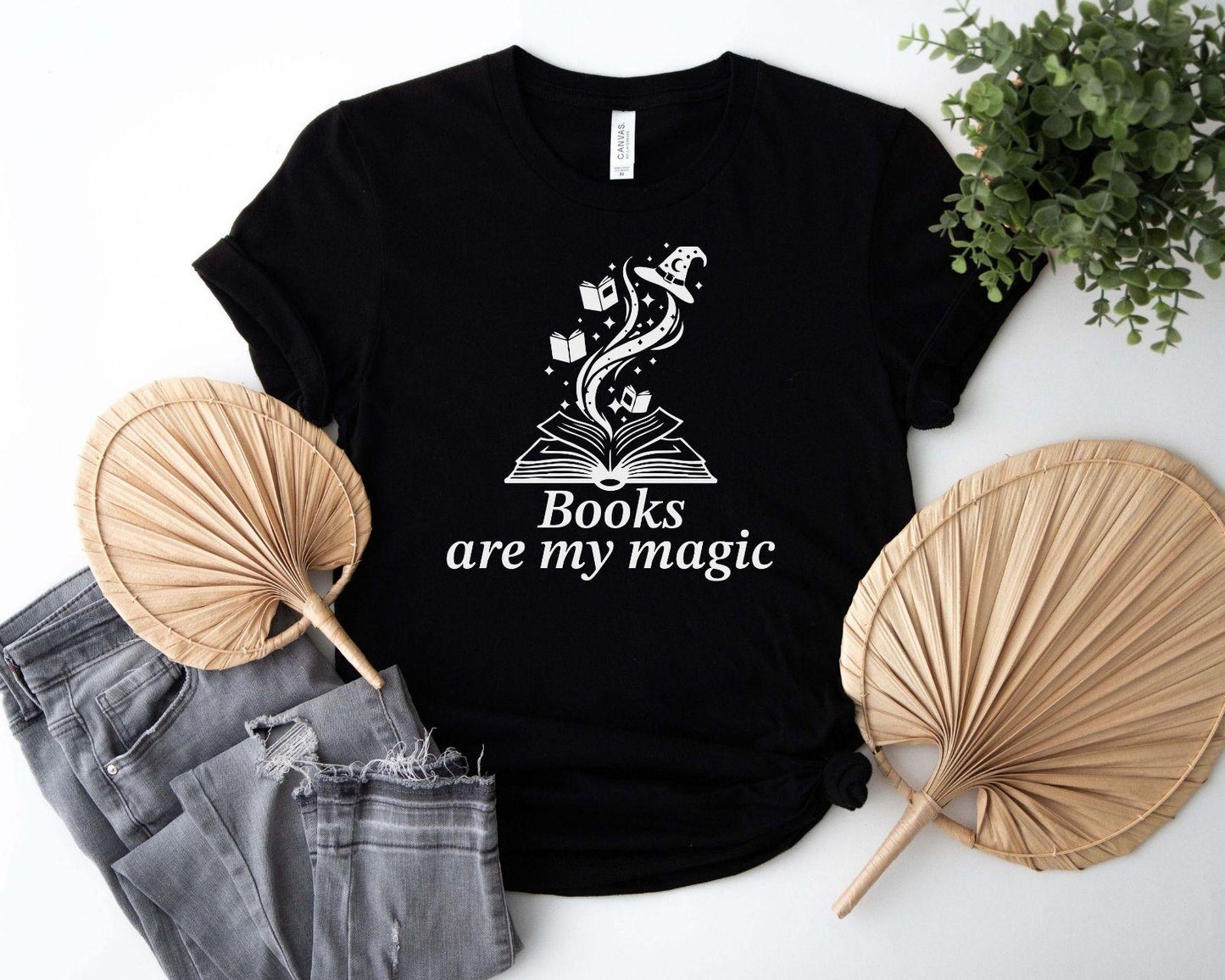 A comfort colors® shirt with the saying "books are my magic"