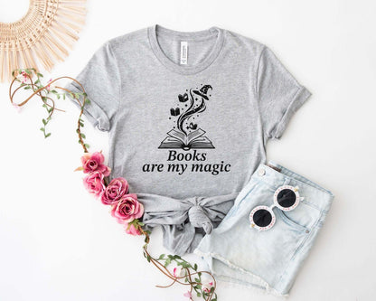 A comfort colors® shirt with the saying "books are my magic"