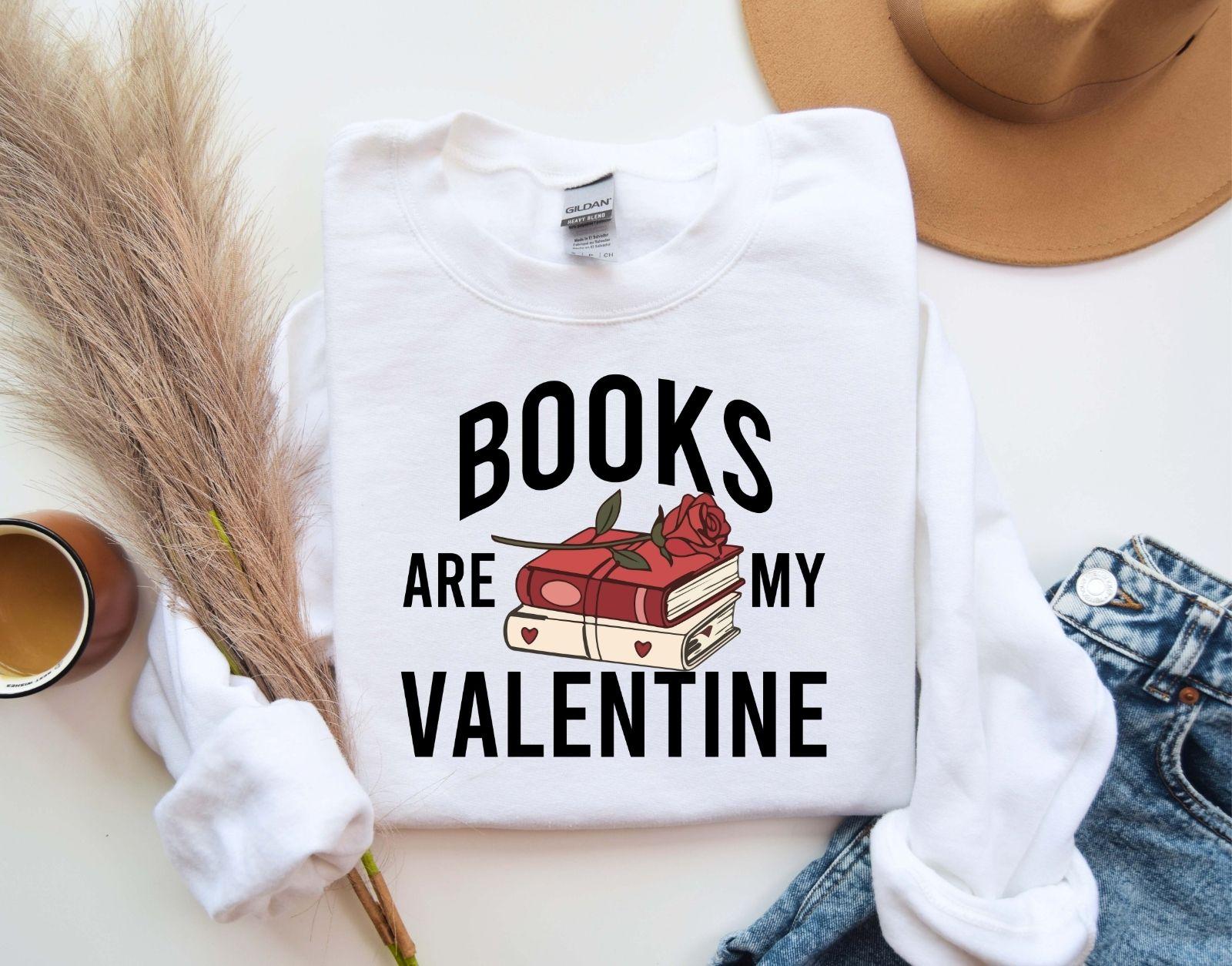 A gildan 18000 sweatshirt with the saying "Books are my velentine"