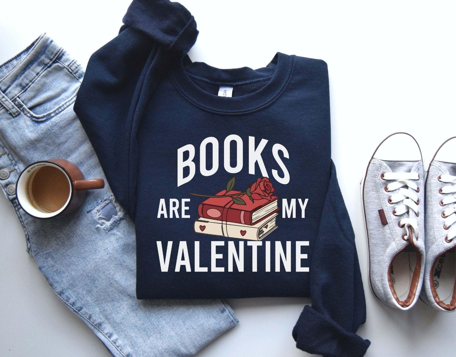 A gildan 18000 sweatshirt with the saying "Books are my velentine"