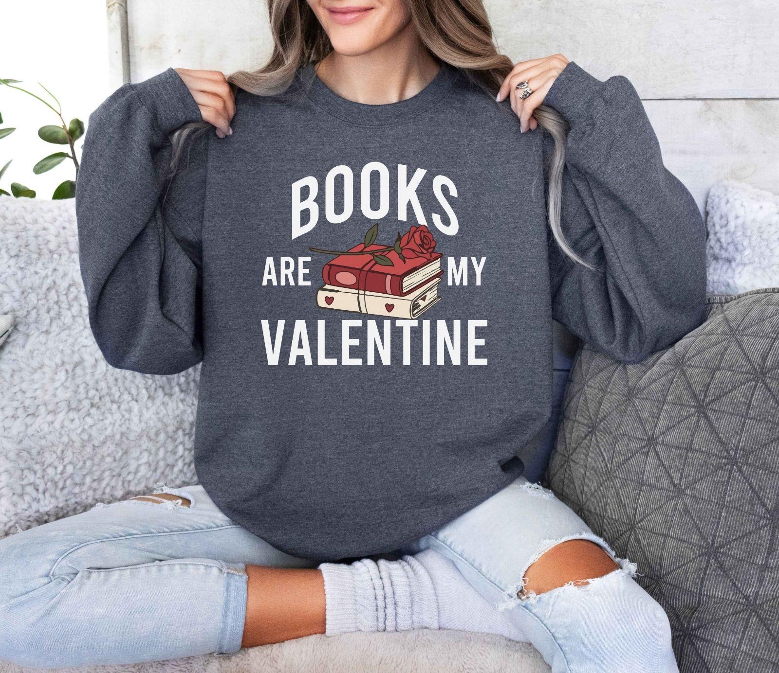 A gildan 18000 sweatshirt with the saying "Books are my velentine"