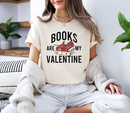 A gildan 18000 sweatshirt with the saying "Books are my valentine"