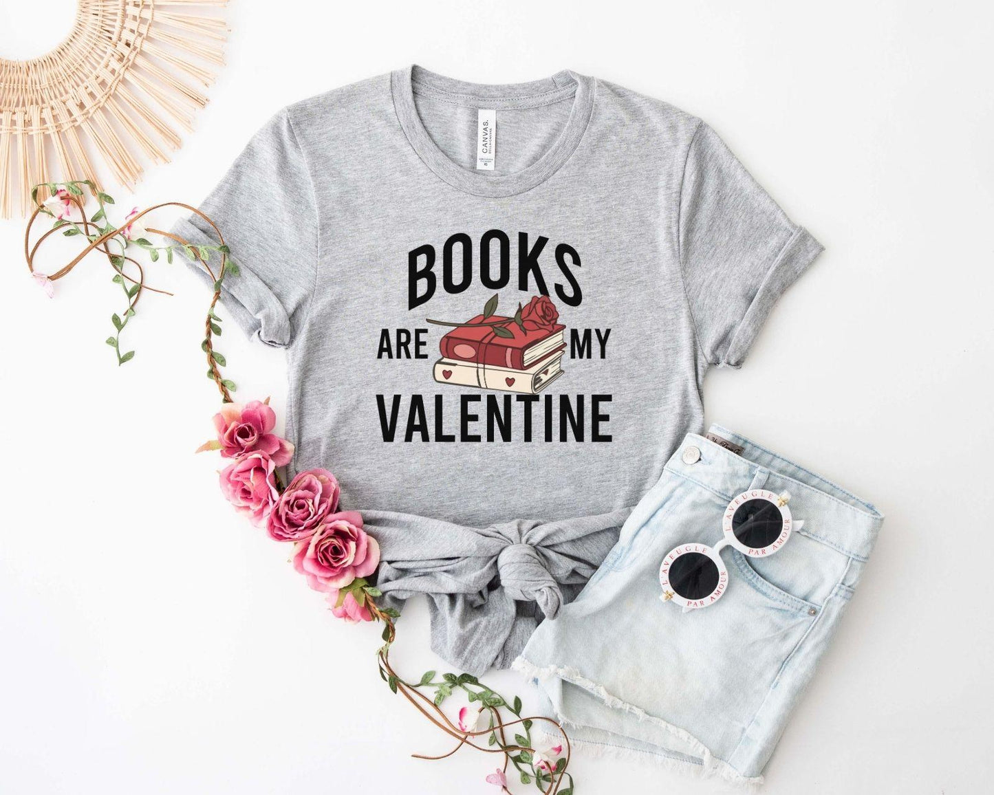 A gildan 18000 sweatshirt with the saying "Books are my valentine"