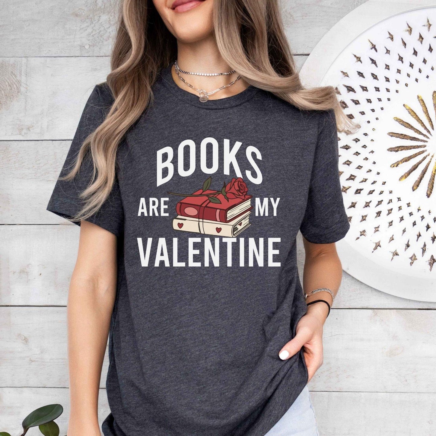 A gildan 18000 sweatshirt with the saying "Books are my valentine"