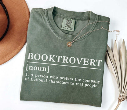 A comfort colors® shirt with the saying "Booktrovert"