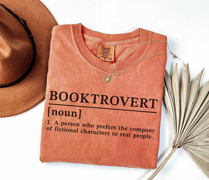 A comfort colors® shirt with the saying "Booktrovert"