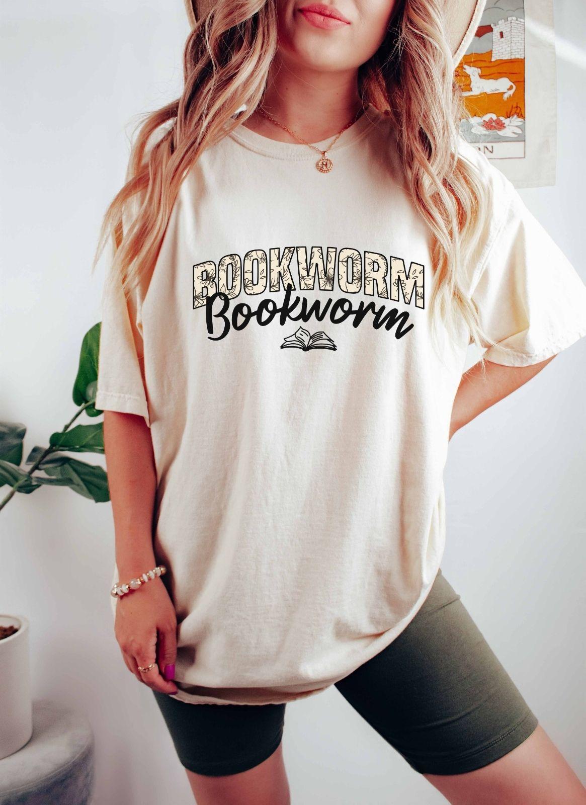 A comfort colors shirt with the saying "Bookworm"