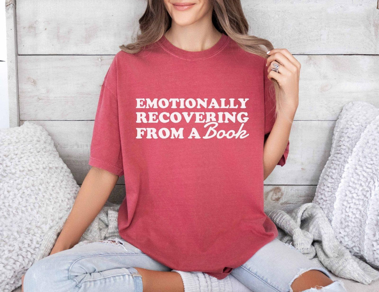 A comfort colors® 1717 shirt with the saying "Emotionally recovering from a book"