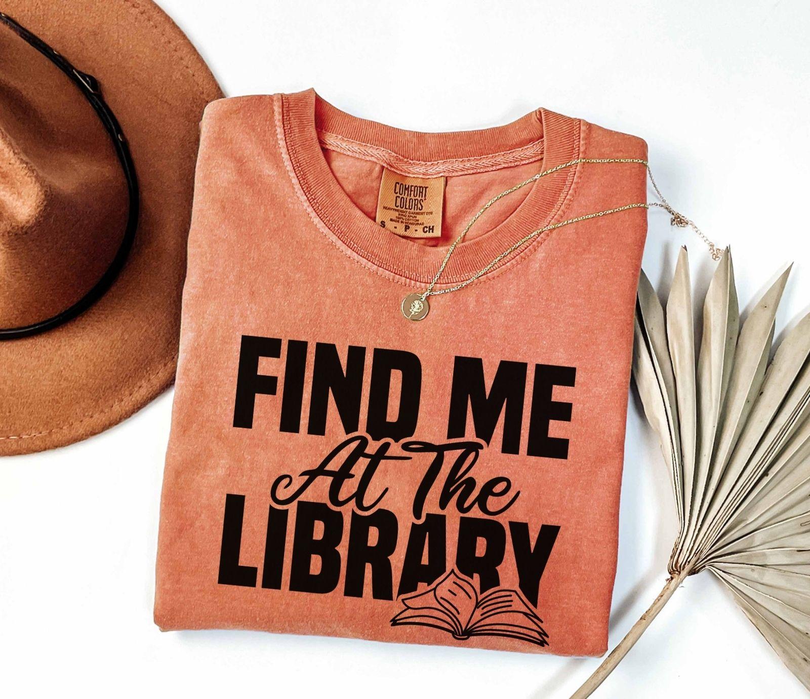 A comfort colors® shirt with the saying "Find me at the library"