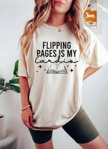 A comfort colors shirt with the saying "Flipping pages is my cardio"